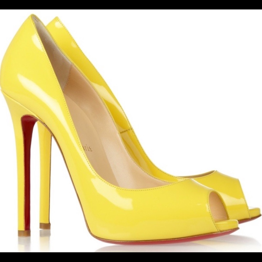 Christian Louboutin yellow leather patent pumps..